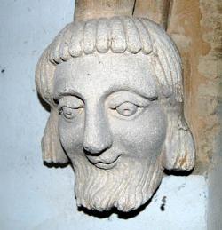 male head in Stagsden church porch December 2007